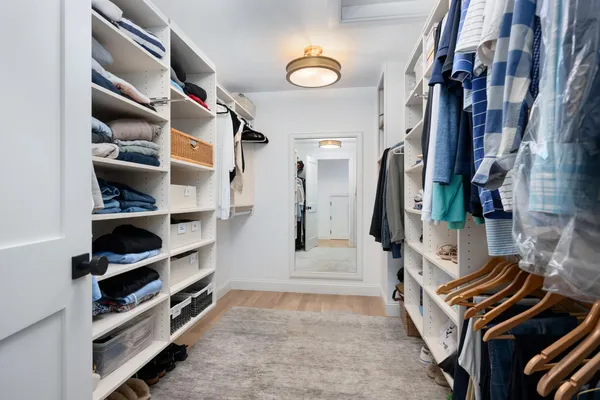 a view of a chair and table in the balcony