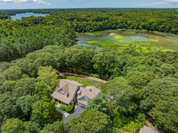 a view of a lake with a yard
