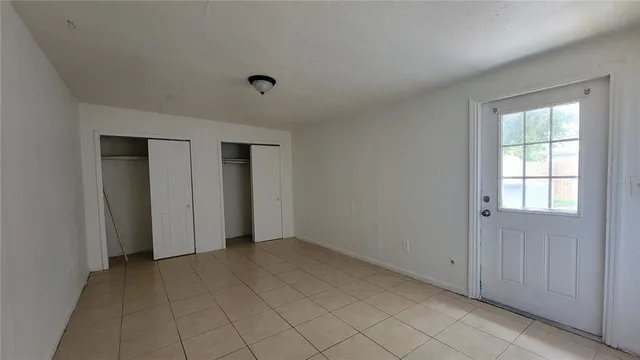 a view of an empty room with window