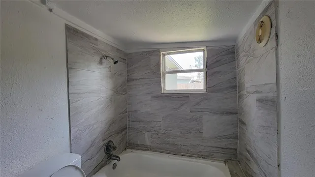 a bathroom with a window