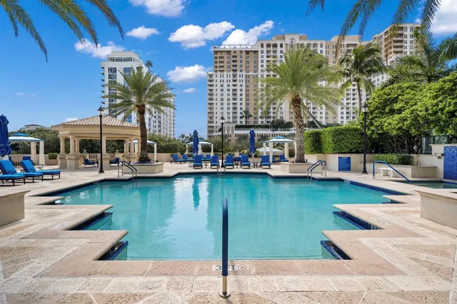 a view of a swimming pool next to a building
