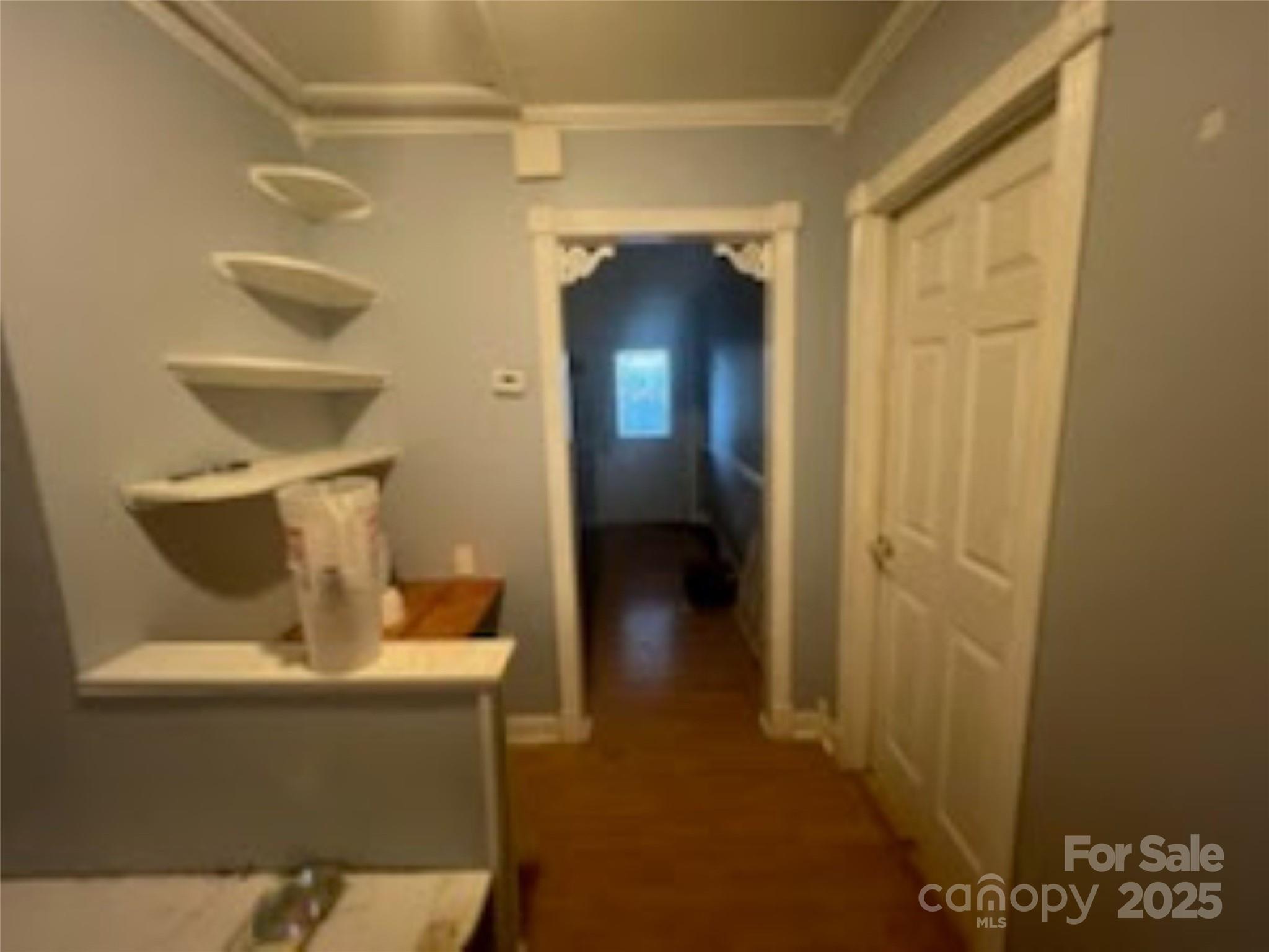 453 Marion Street Calhoun Falls, SC 29628 - Photo 11 of 24 a view of hallway with washer and dryer
