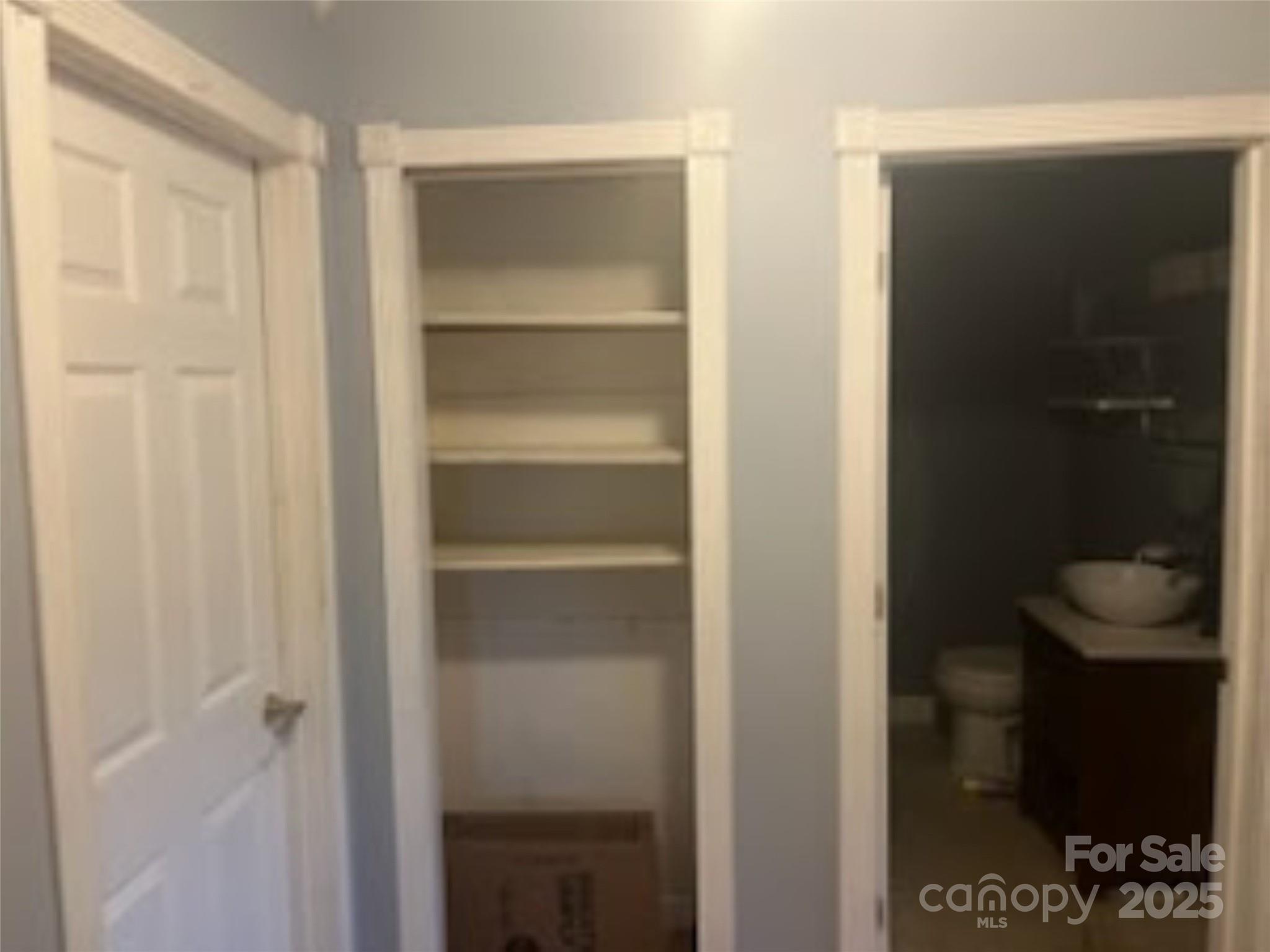 453 Marion Street Calhoun Falls, SC 29628 - Photo 7 of 24 a bathroom with a glass shower door
