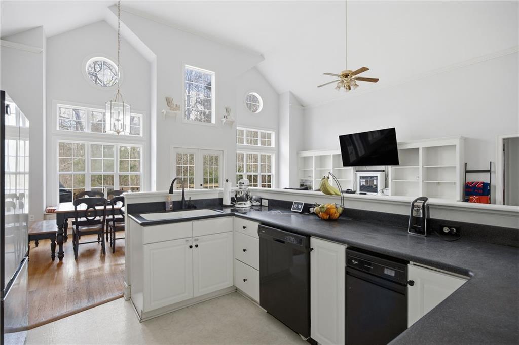 7387 Milam Road Winston, GA 30187 - Photo 15 of 41 a kitchen with a sink stove and cabinets
