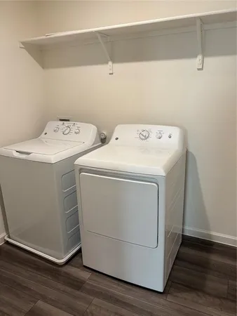 a utility room with dryer and washer