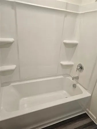 a bathroom with a bathtub