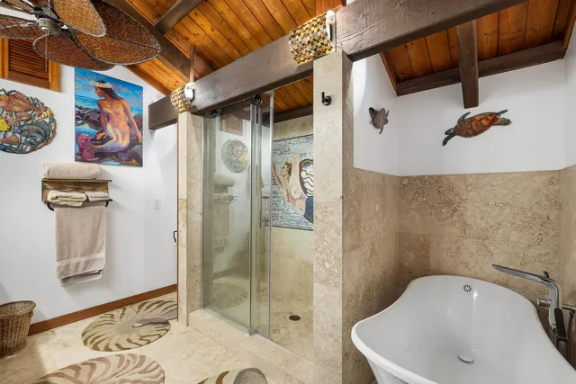 a bathroom with a sink and shower