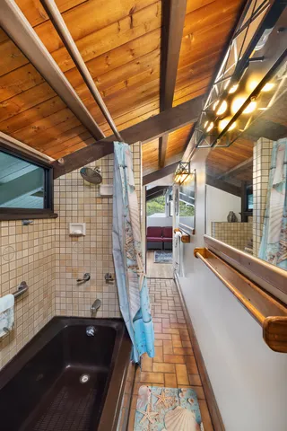 a bathroom with a sink and mirror