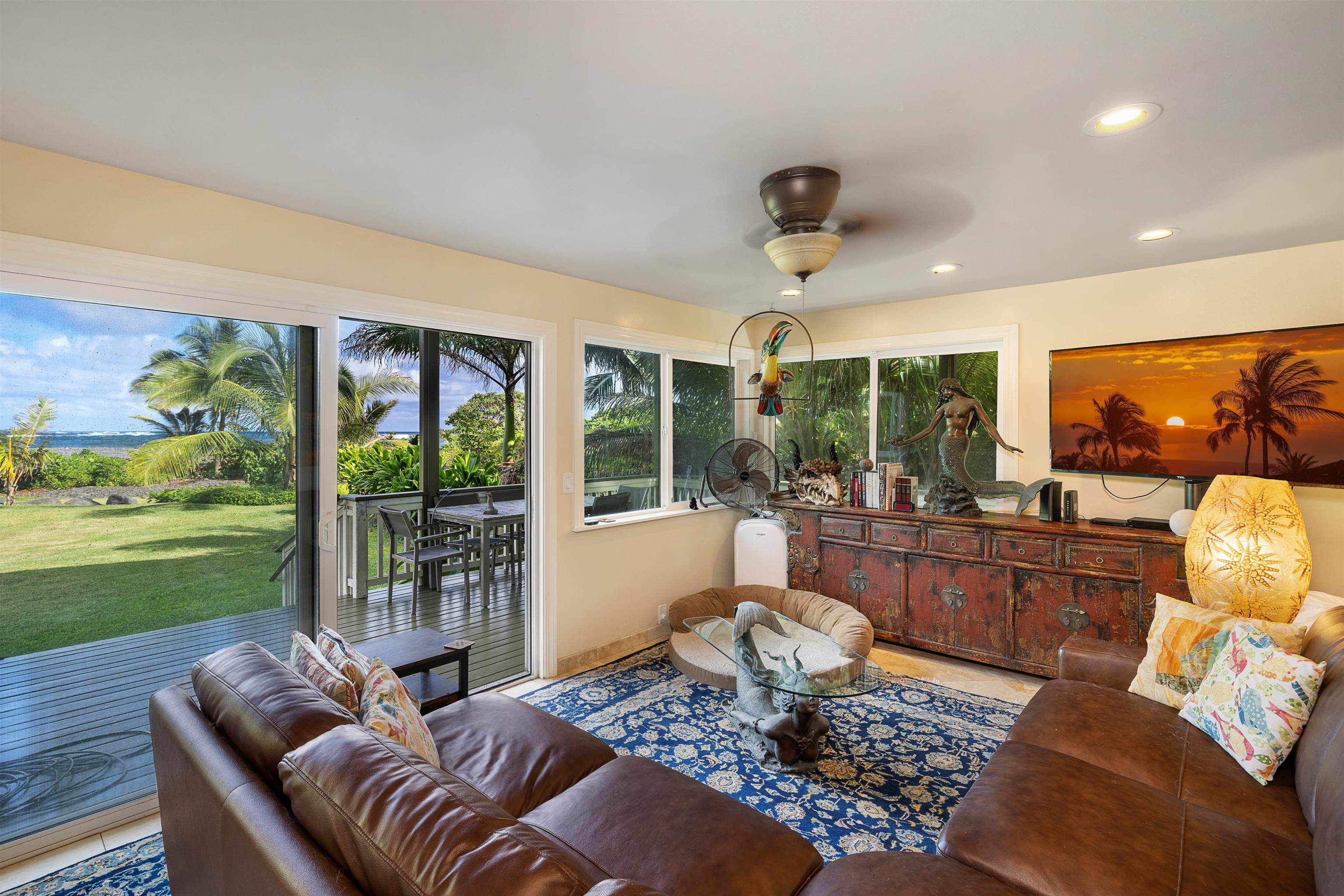 140 Waikoloa Road Hana, HI 96713 - Photo 7 of 32 a living room with furniture and a large window