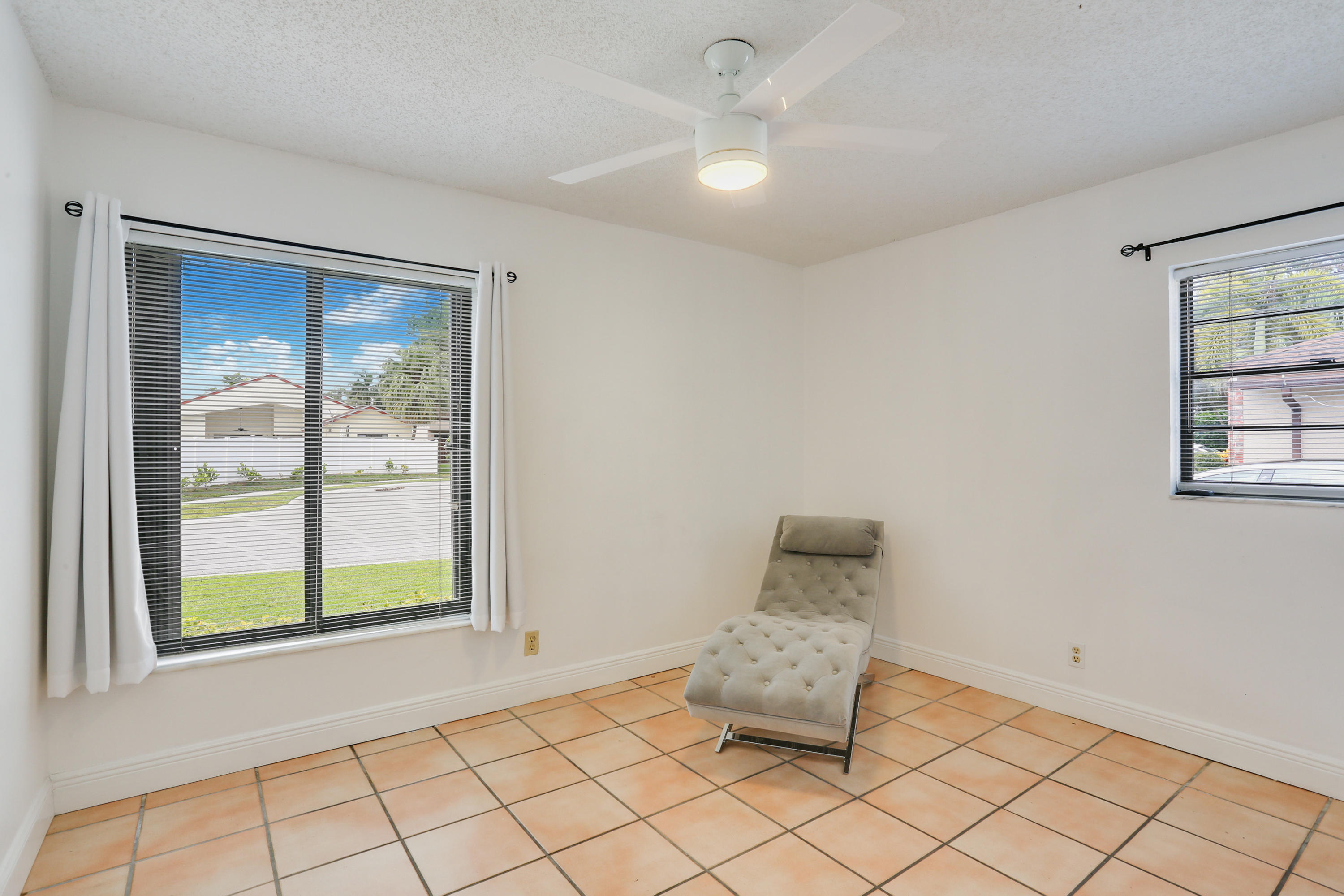 11402 Country Sound Court Boca Raton, FL 33428 - Photo 12 of 22 a living room with furniture and a window