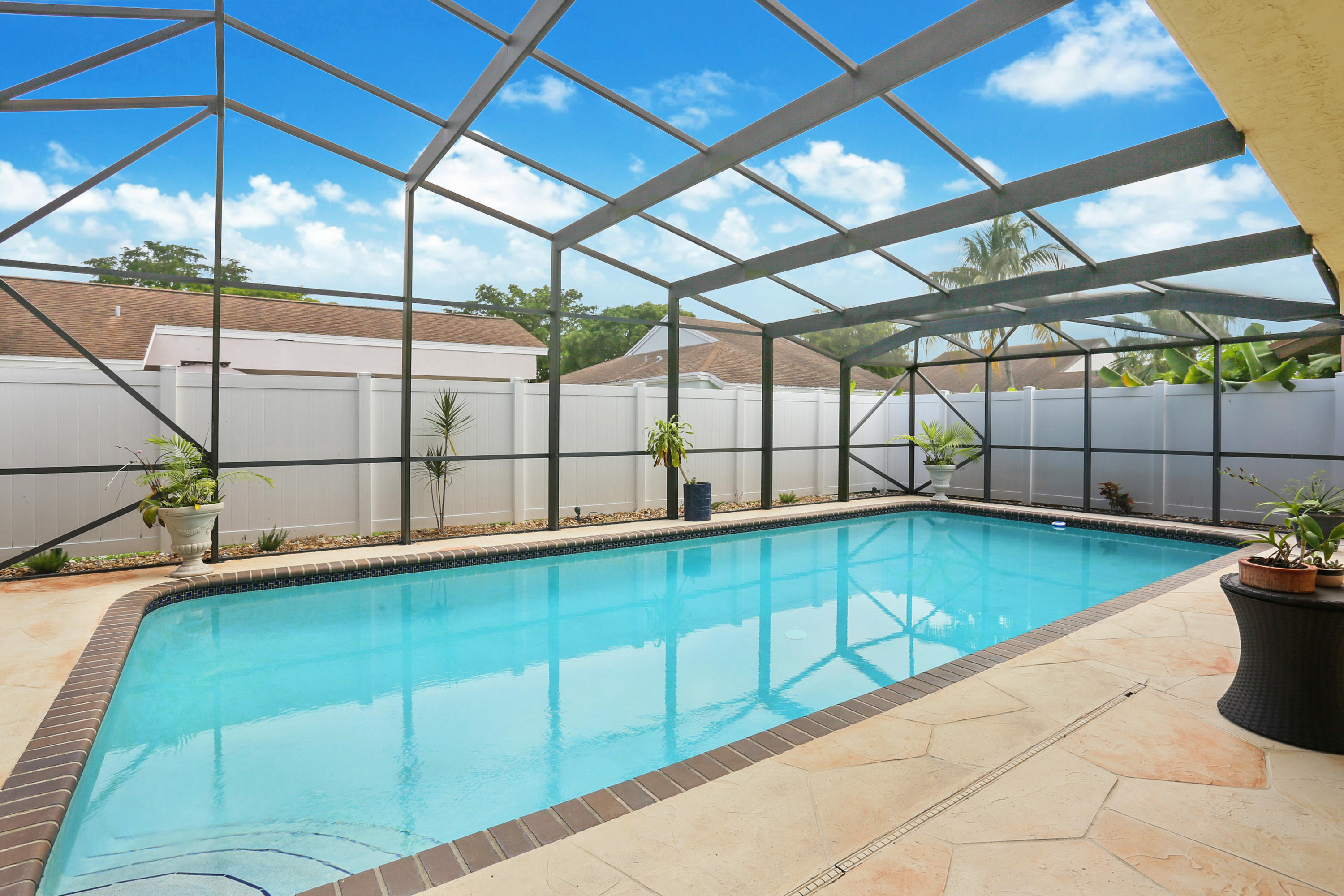 11402 Country Sound Court Boca Raton, FL 33428 - Photo 17 of 22 a view of a backyard