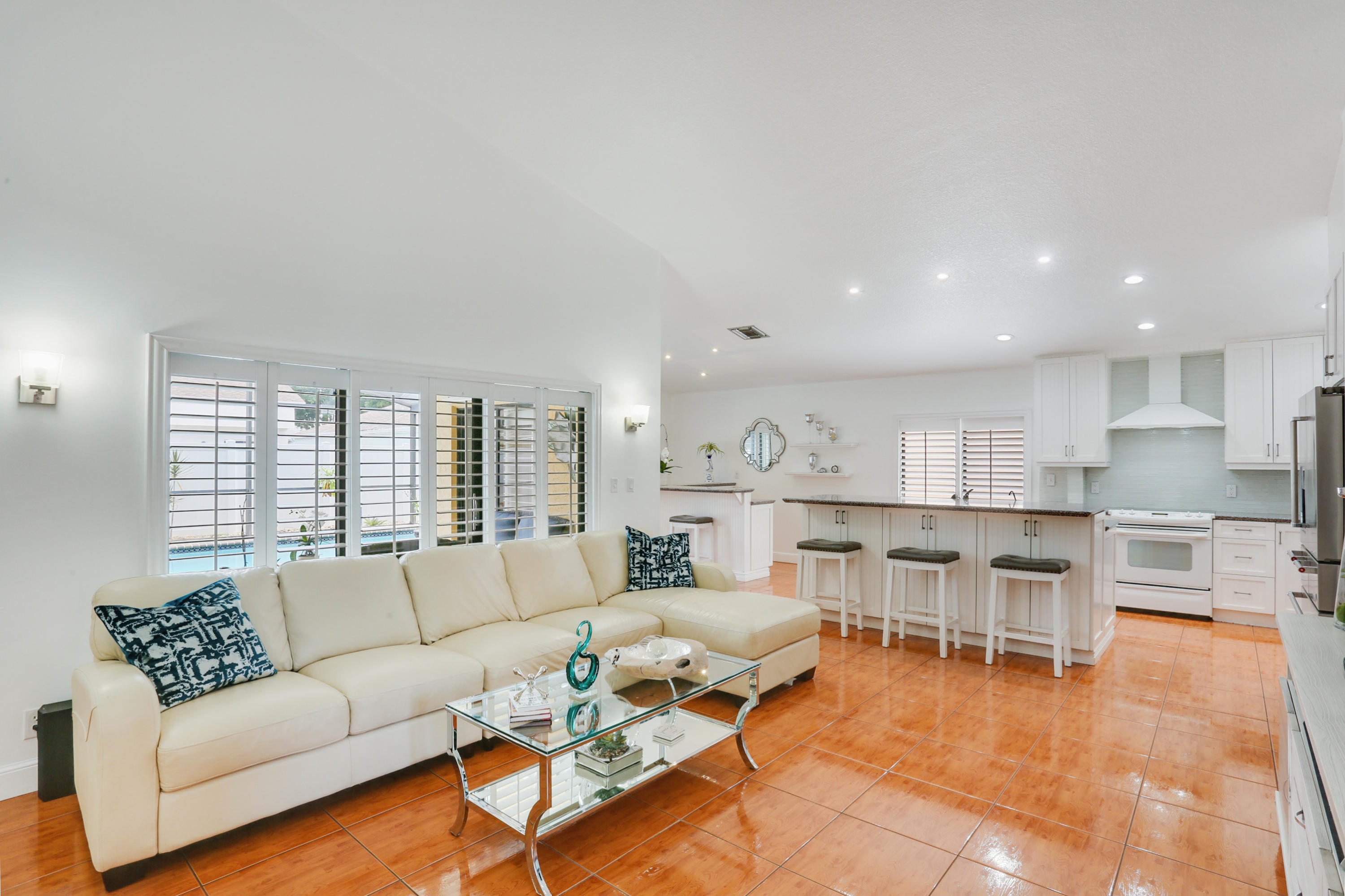 11402 Country Sound Court Boca Raton, FL 33428 - Photo 6 of 22 a living room with furniture and a large window