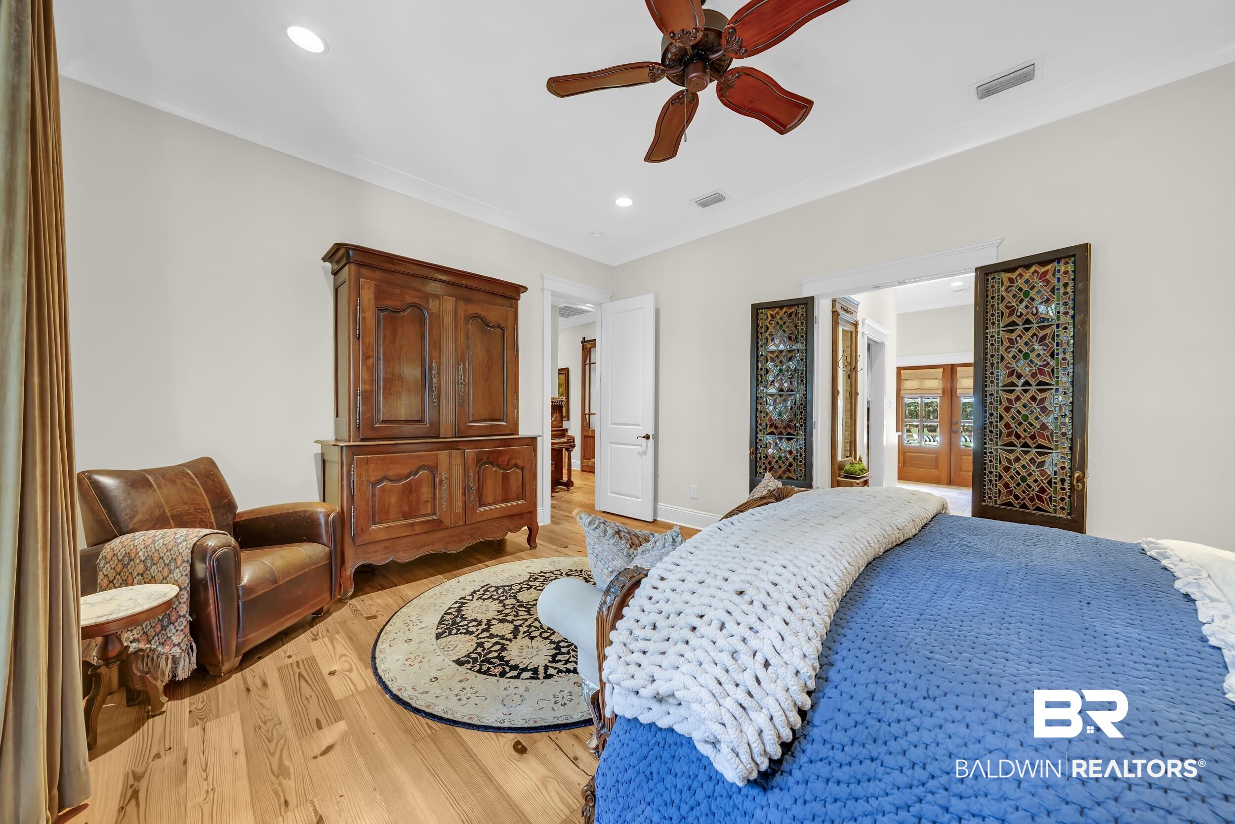 12161 Jessamine Street Magnolia Springs, AL 36555 - Photo 26 of 70 Bedroom with light wood finished floors, recessed lighting, and ceiling fan