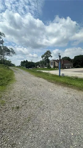 a view of a golf course with a lake