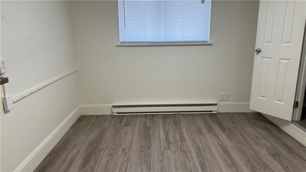 2858 B Freeport Road Natrona Heights, PA 15065 - Photo 24 of 29 a view of a room with wooden floor and a window