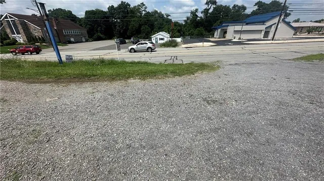 a view of a backyard of the house