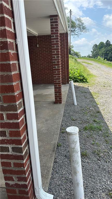 2858 B Freeport Road Natrona Heights, PA 15065 - Photo 9 of 29 a view of a pathway along the building