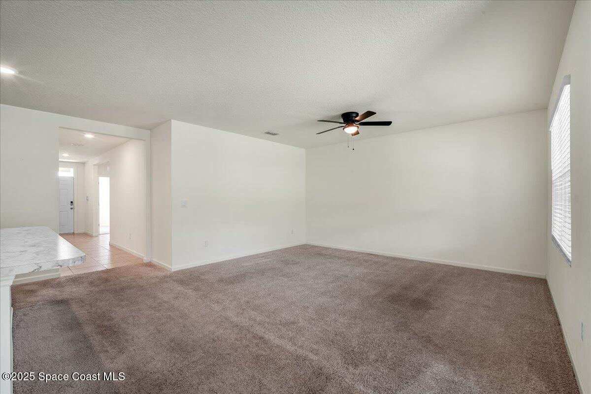 1841 Saxton Road Cocoa, FL 32926 - Photo 15 of 45 a view of a big room with closet and windows