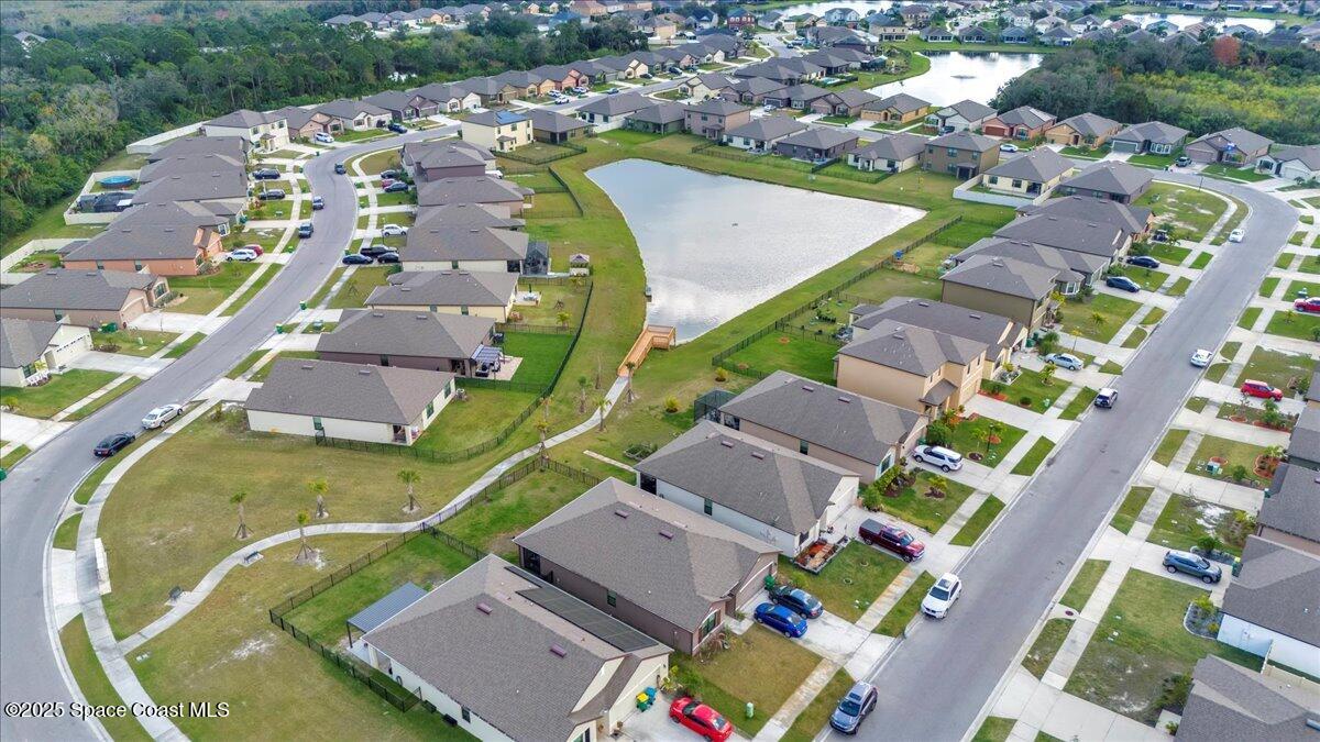 1841 Saxton Road Cocoa, FL 32926 - Photo 37 of 45 an aerial view of a residential houses with outdoor space and swimming pool
