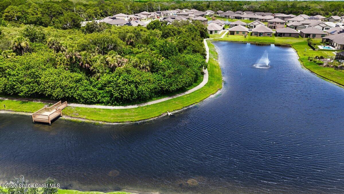 1841 Saxton Road Cocoa, FL 32926 - Photo 43 of 45 a view of a swimming pool with a yard