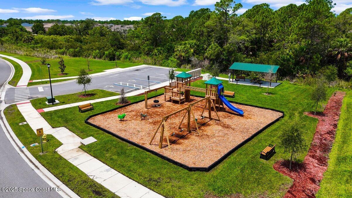 1841 Saxton Road Cocoa, FL 32926 - Photo 45 of 45 an aerial view of a house with swimming pool a patio and yard