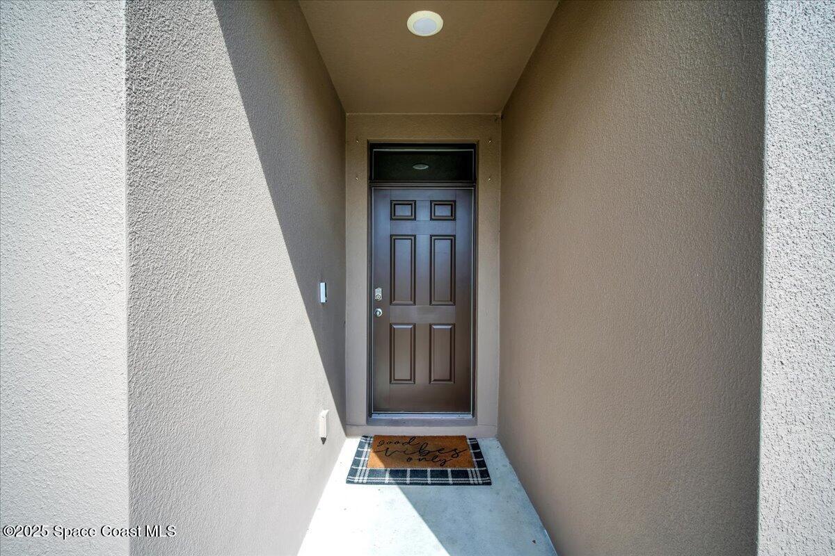 1841 Saxton Road Cocoa, FL 32926 - Photo 9 of 45 a view of a hallway with entryway