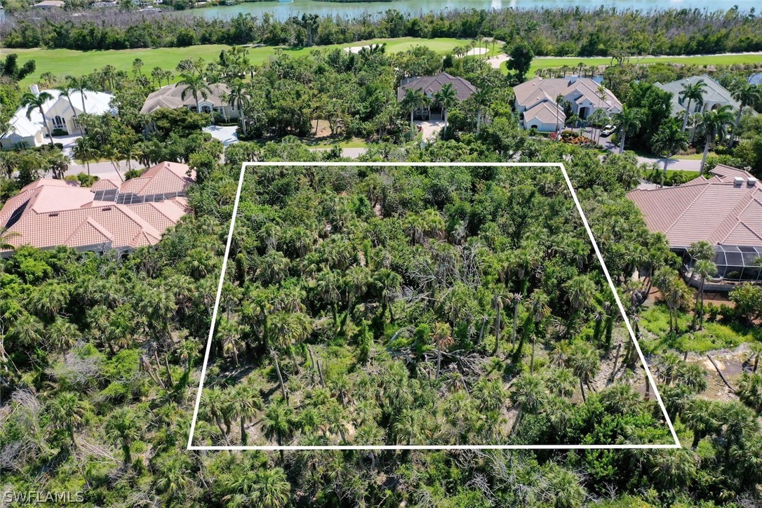 2348 Wulfert Road Sanibel, FL 33957 - Photo 22 of 24 an aerial view of a house with a yard