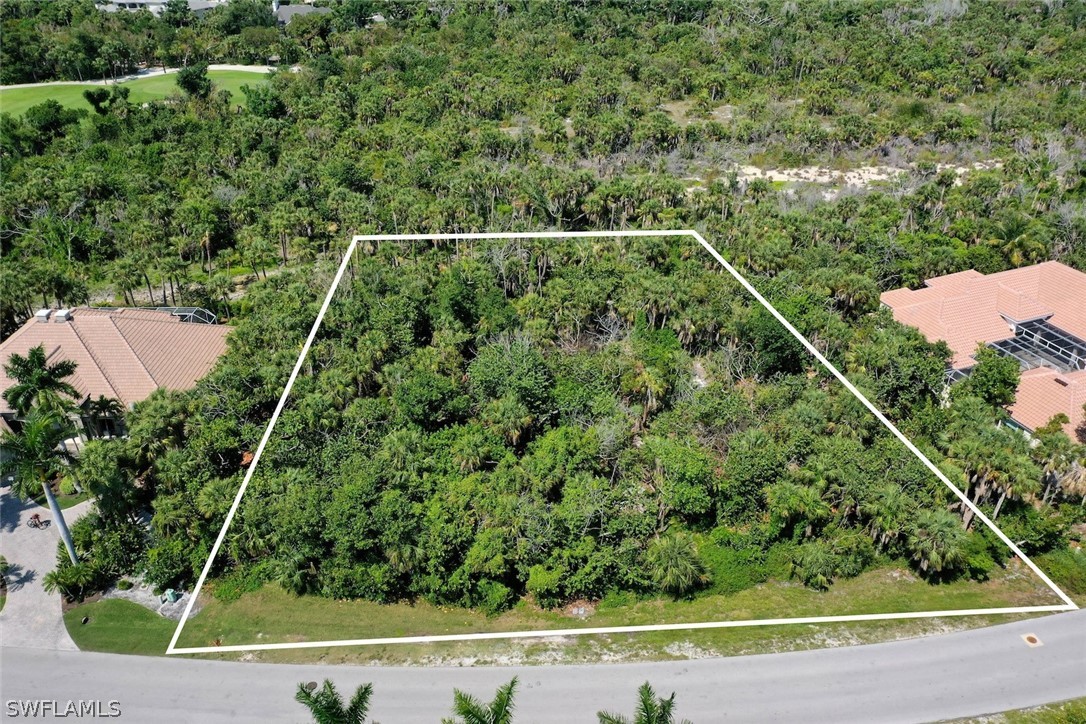2348 Wulfert Road Sanibel, FL 33957 - Photo 24 of 24 an aerial view of a house with a yard