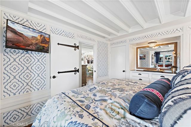 a bathroom with a shower and a sink