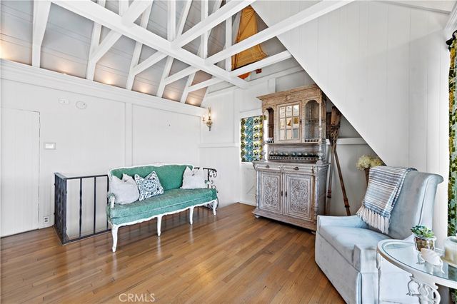 a view of a patio with iron fence