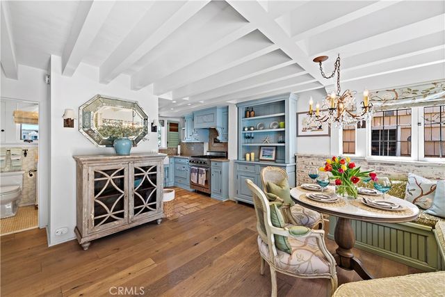 a kitchen with a stove and a sink