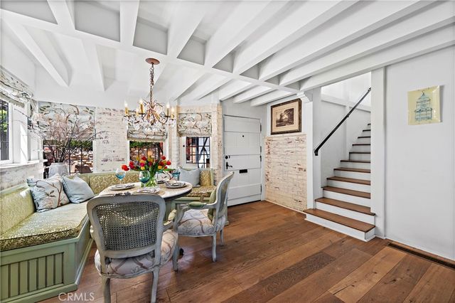 a bedroom with a large bed and a couch