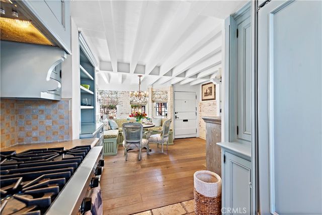 a bedroom with a large bed and a large window