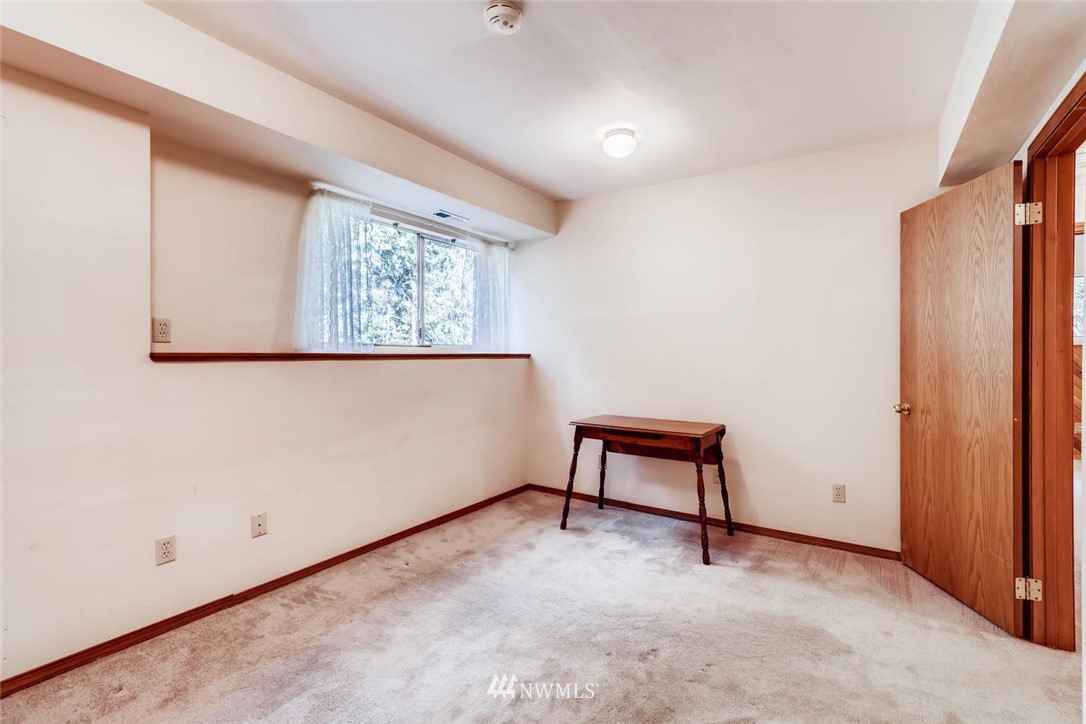 1908 233rd Place Southeast Bothell, WA 98021 - Photo 19 of 24 an empty room with windows