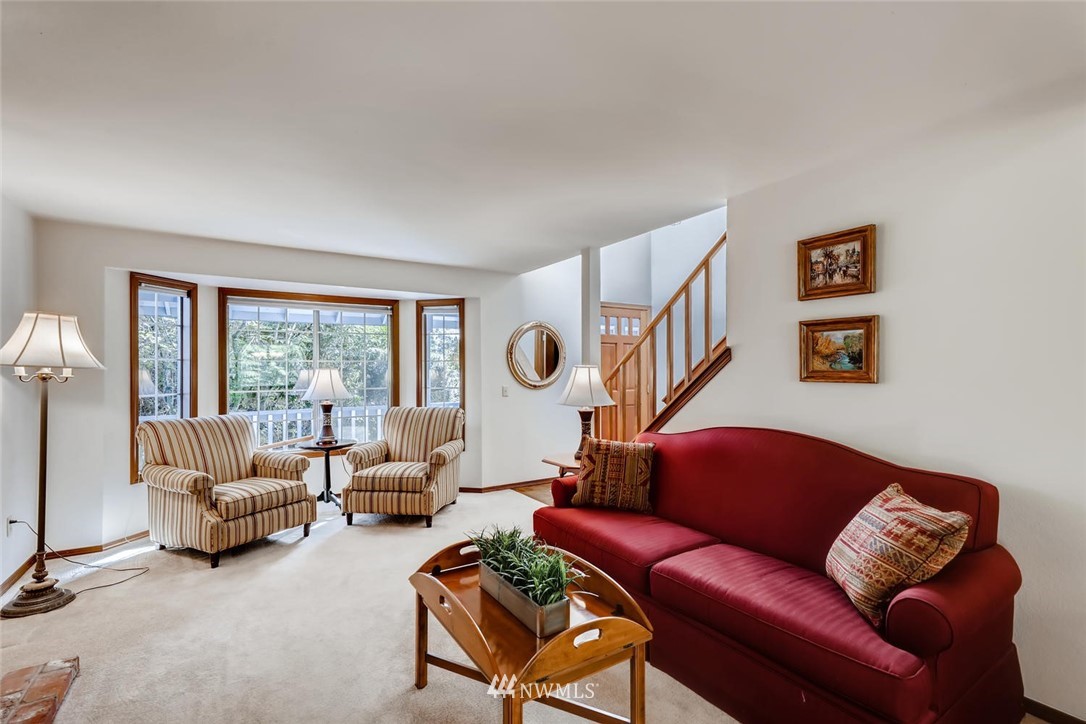 1908 233rd Place Southeast Bothell, WA 98021 - Photo 3 of 24 a living room with furniture ceiling fan and a window
