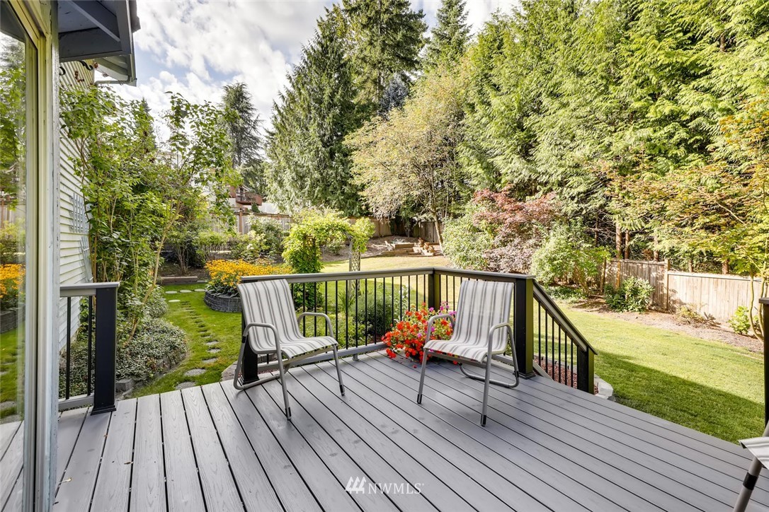 1908 233rd Place Southeast Bothell, WA 98021 - Photo 22 of 24 a view of balcony with wooden floor and outdoor seating