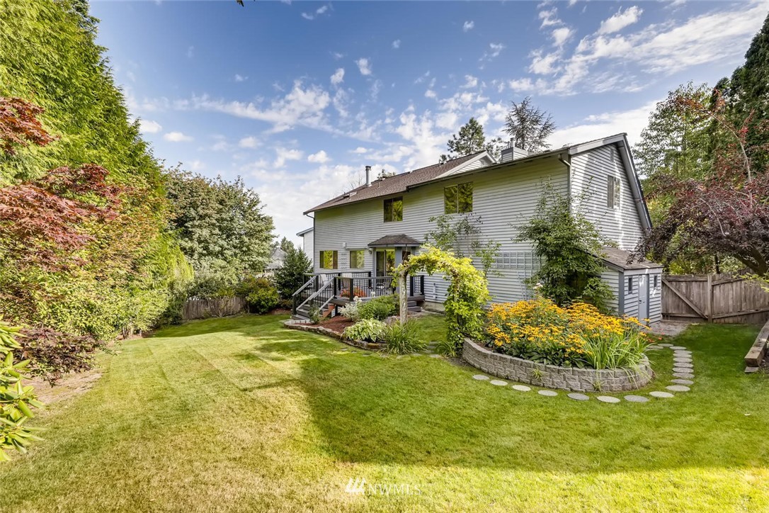 1908 233rd Place Southeast Bothell, WA 98021 - Photo 24 of 24 a view of a house with a yard