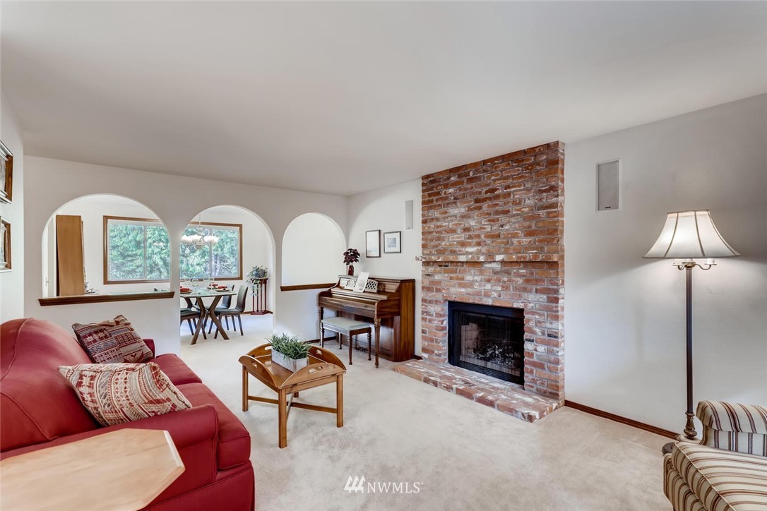 1908 233rd Place Southeast Bothell, WA 98021 - Photo 4 of 24 a living room with furniture fireplace and window