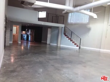 a view of staircase and hallway with stairs
