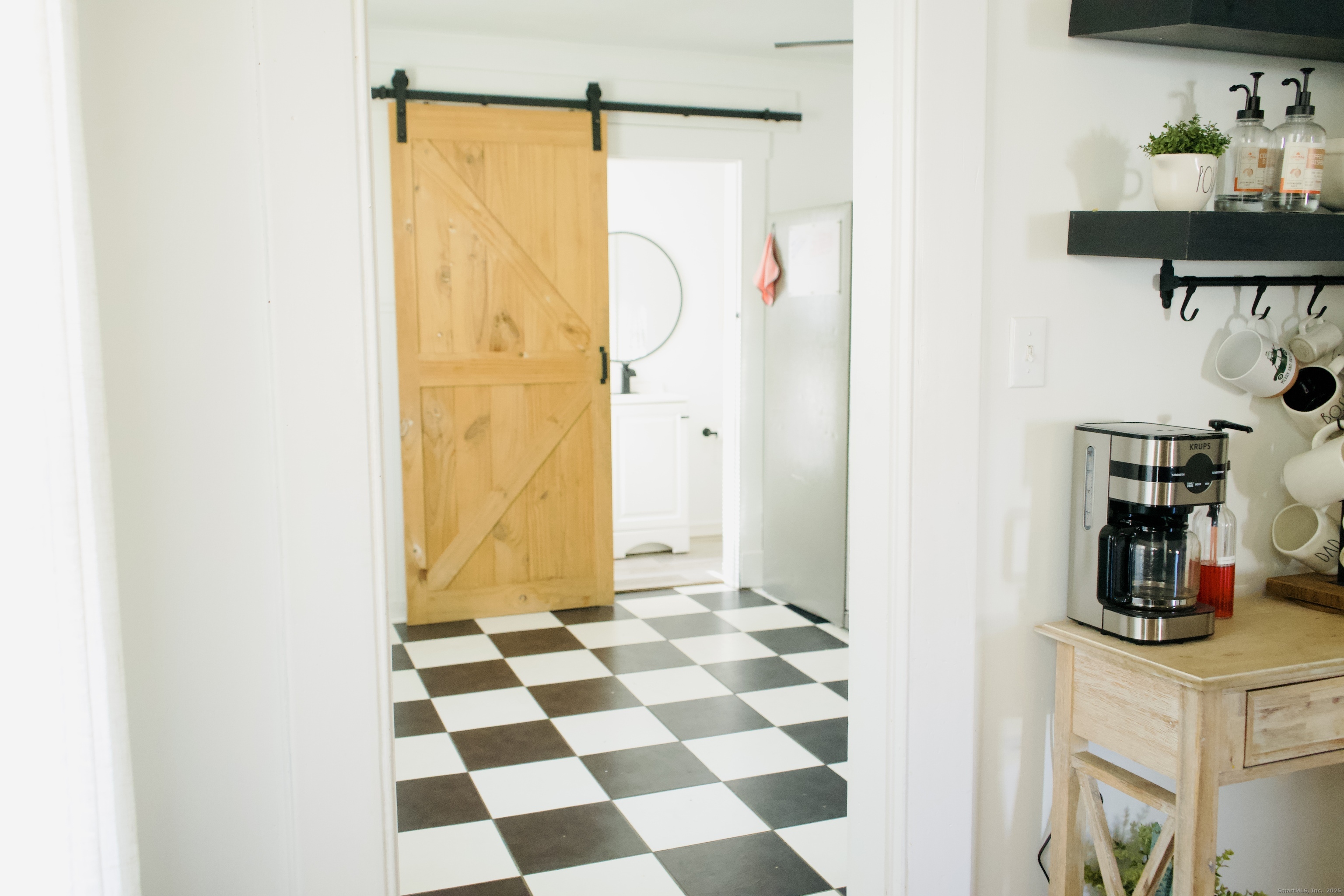 66 North Hoadley Street Naugatuck, CT 06770 - Photo 15 of 22 a bathroom with a granite countertop sink and a shower