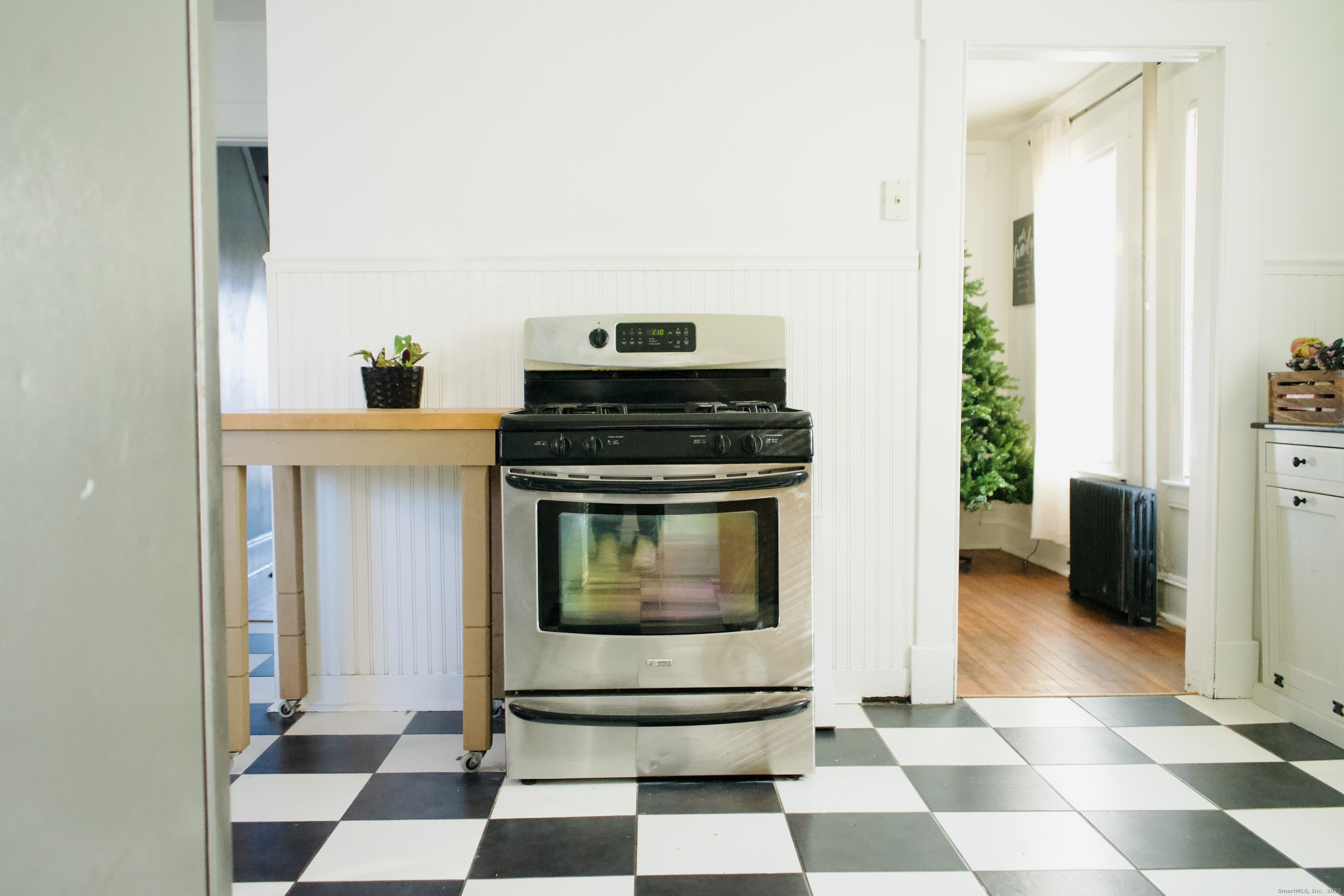 66 North Hoadley Street Naugatuck, CT 06770 - Photo 21 of 22 a kitchen with a stove and a refrigerator