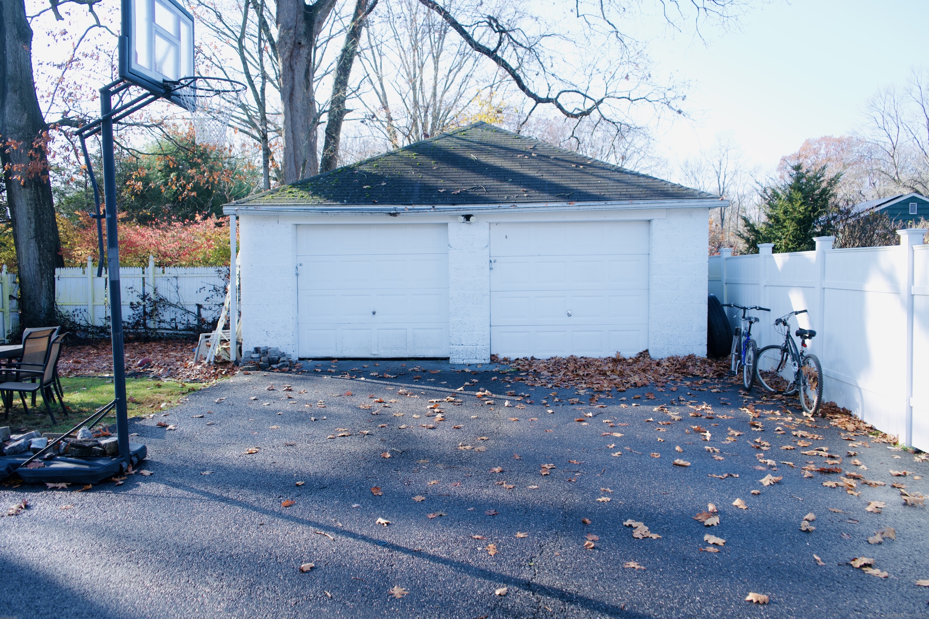 66 North Hoadley Street Naugatuck, CT 06770 - Photo 3 of 22 a view of a backyard with plants and trees