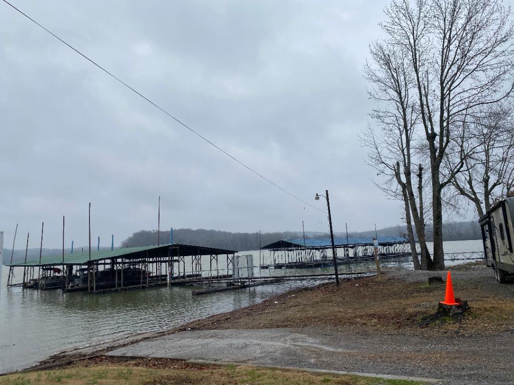 56 Ridge Top Road Stewart, TN 37175 - Photo 12 of 12 a blue swimming pool with outdoor seating and yard