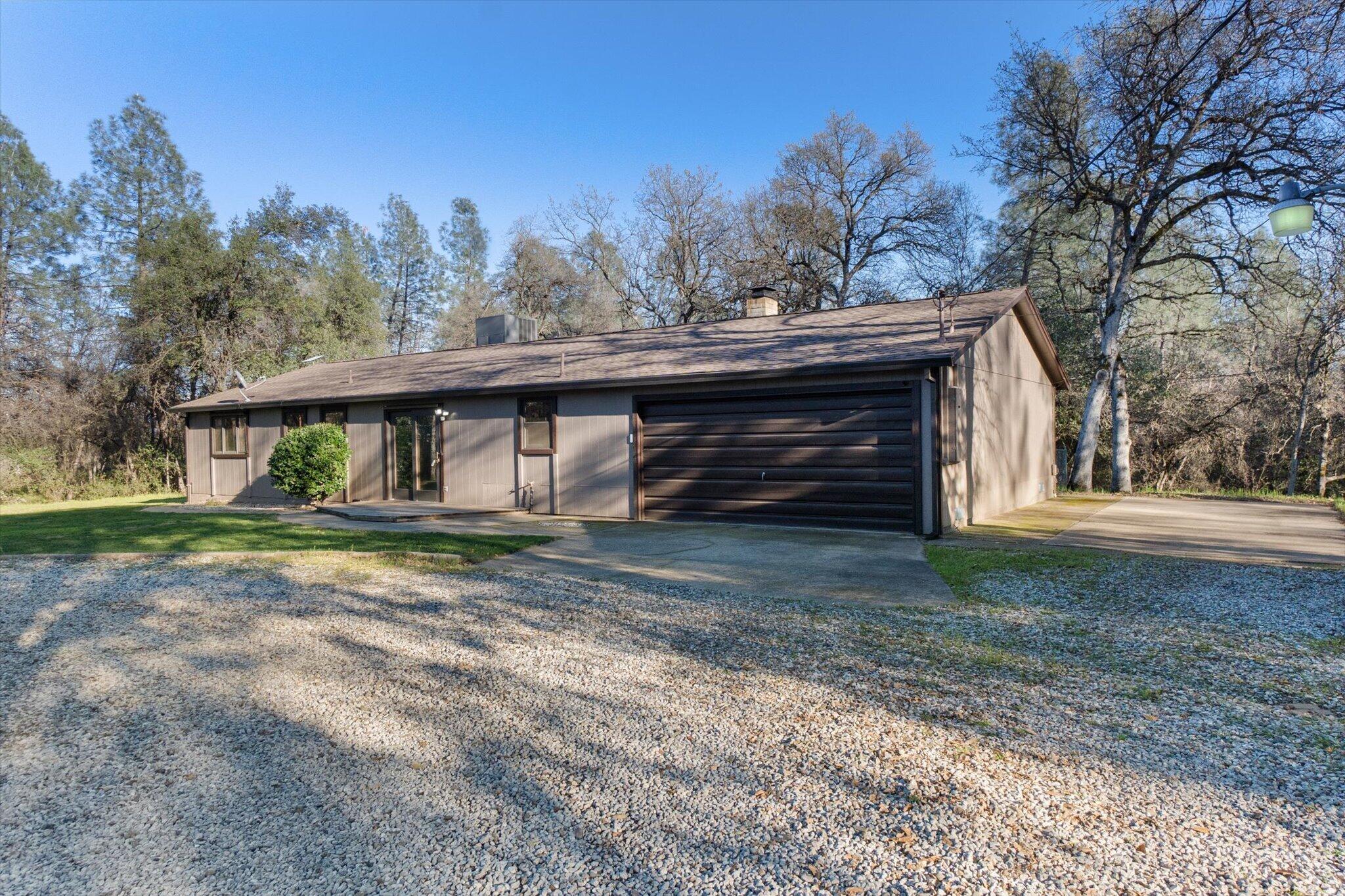 8003 Narrows Way Redding, CA 96001 - Photo 11 of 40 a view of a house with a yard