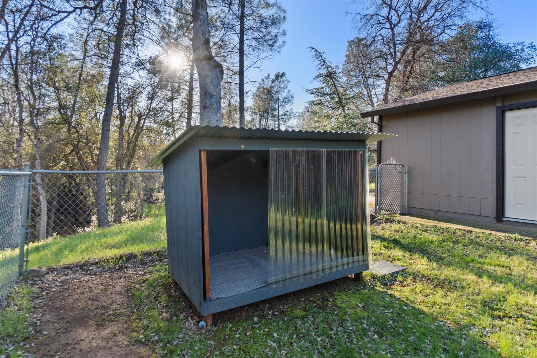 8003 Narrows Way Redding, CA 96001 - Photo 31 of 40 a backyard of a house with lots of green space