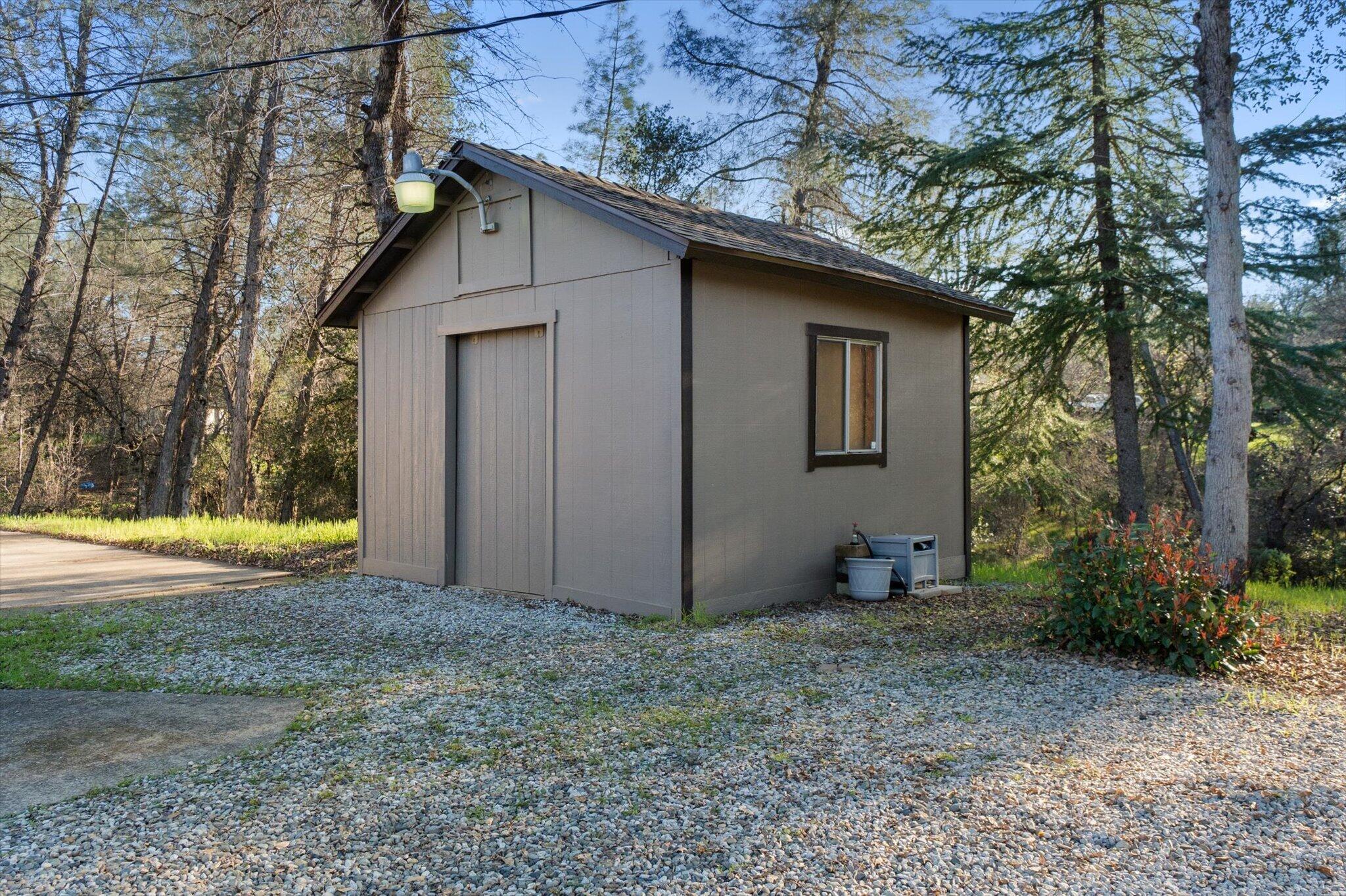 8003 Narrows Way Redding, CA 96001 - Photo 35 of 40 a view of a house with backyard and swimming pool