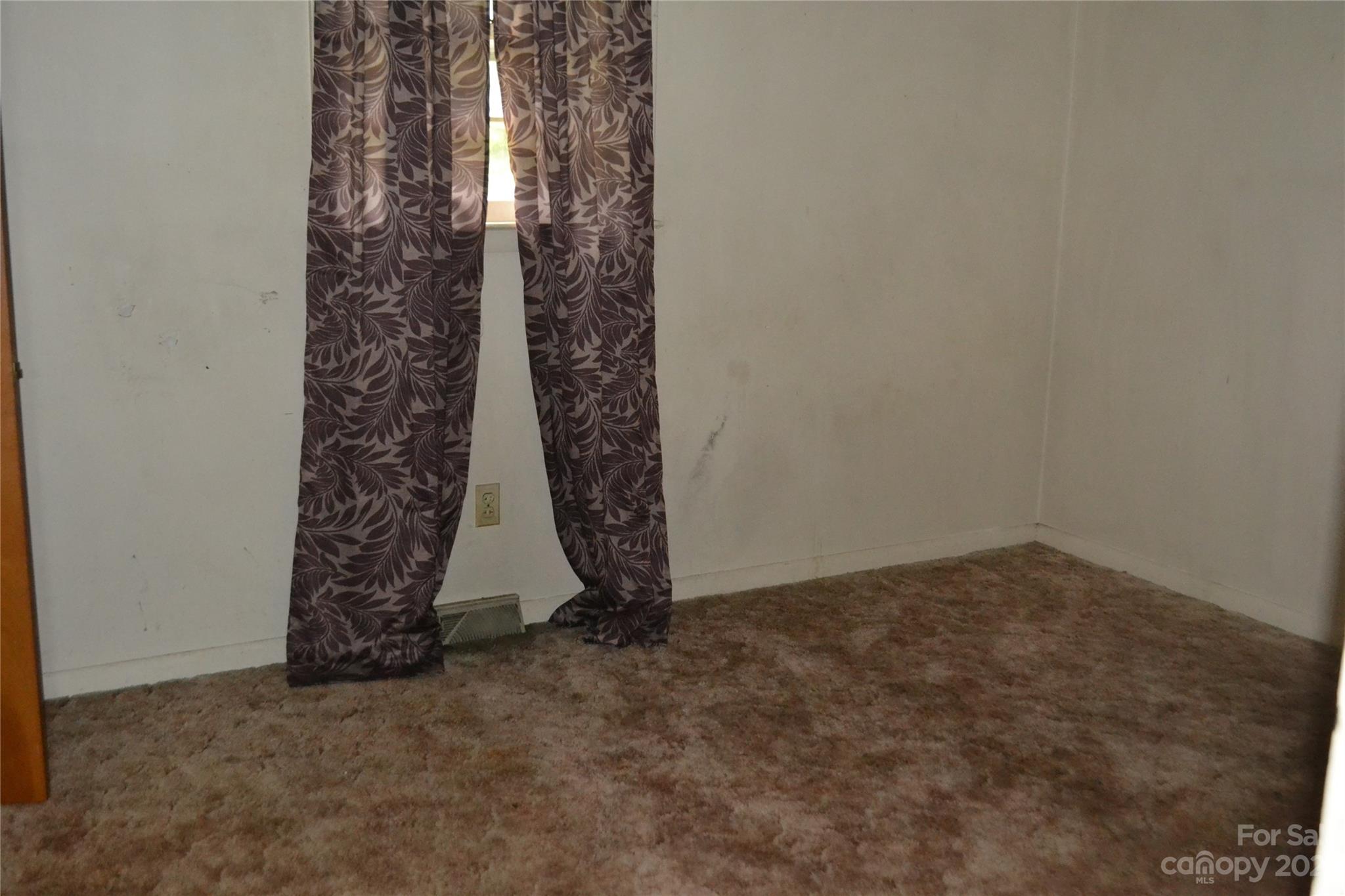 253 Green Acres Road Mooresboro, NC 28114 - Photo 12 of 20 an empty room with window