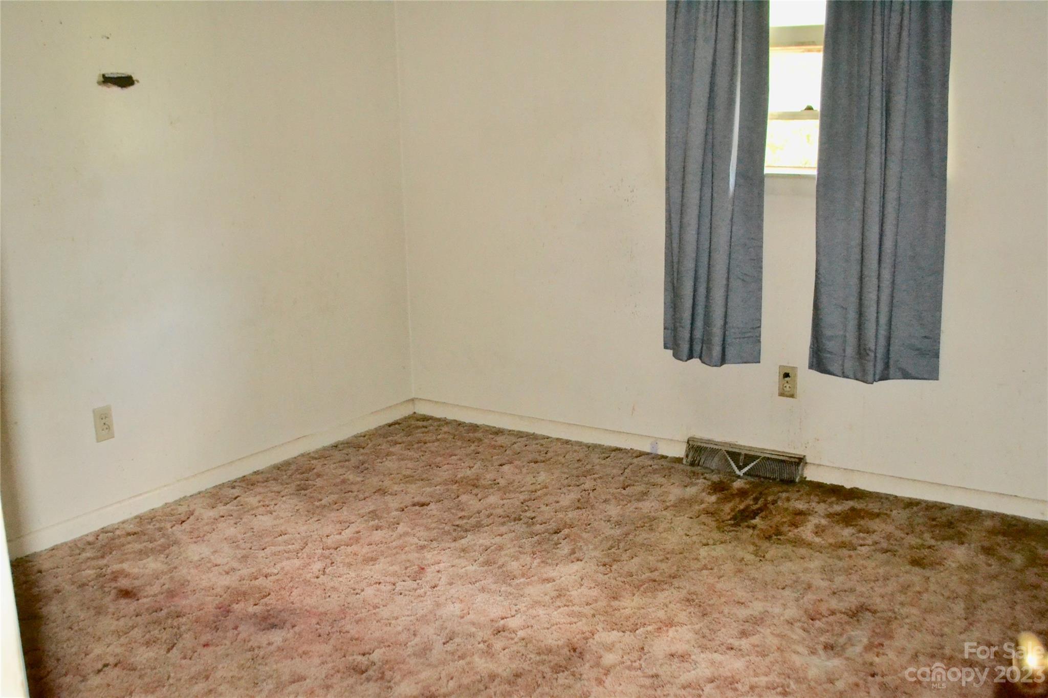253 Green Acres Road Mooresboro, NC 28114 - Photo 14 of 20 a view of an empty room and window