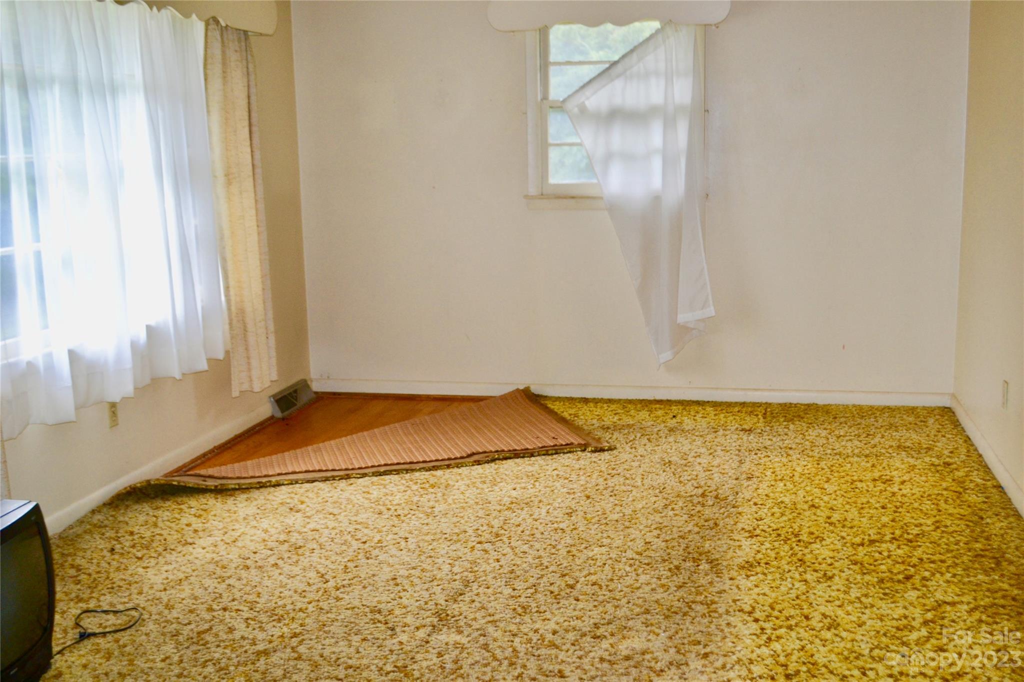 253 Green Acres Road Mooresboro, NC 28114 - Photo 6 of 20 a view of an empty room and window