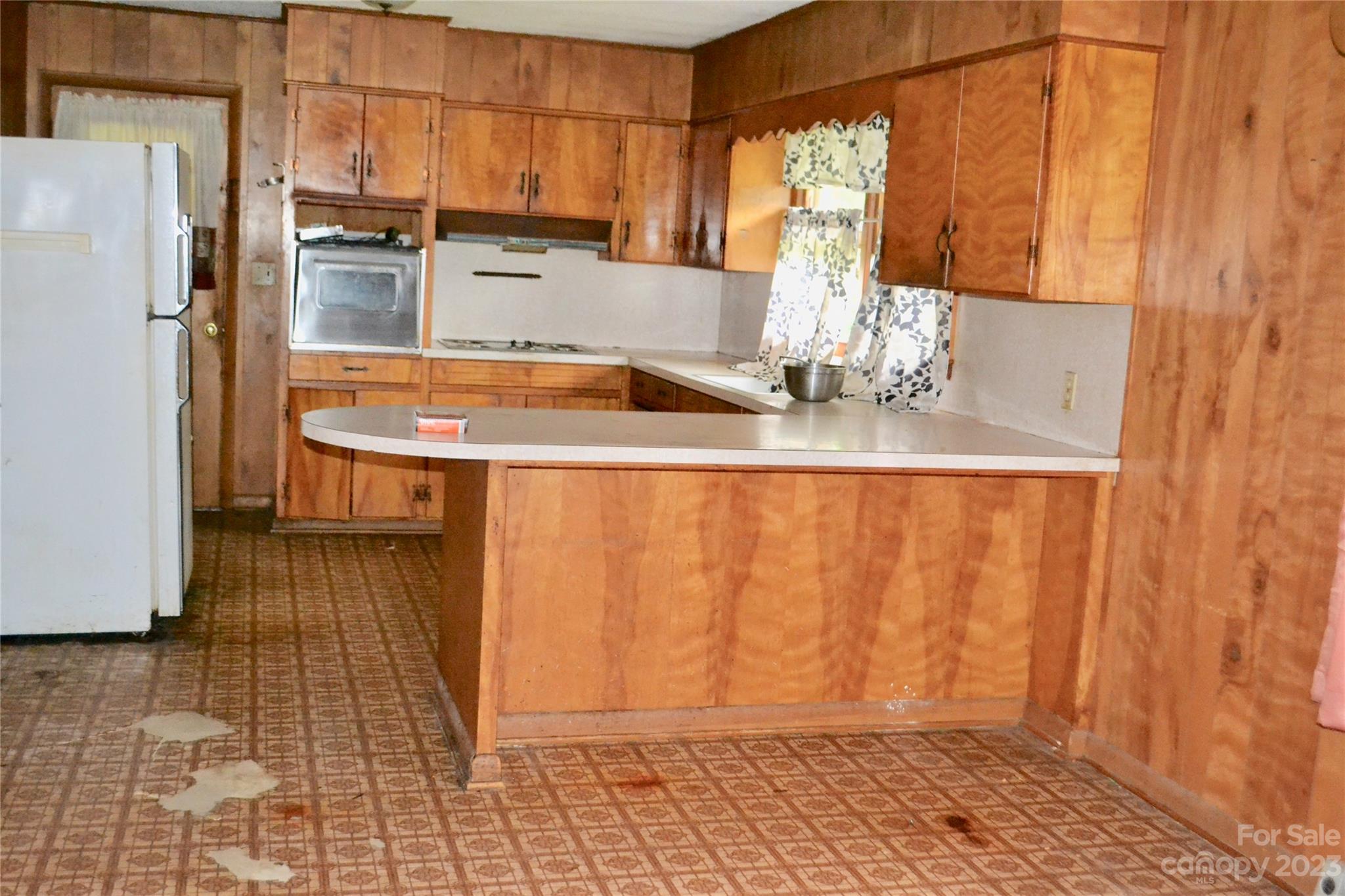 253 Green Acres Road Mooresboro, NC 28114 - Photo 7 of 20 a view of a kitchen with a sink